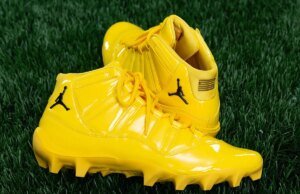 Michigan Douses Their PE Air Jordan 11 Cleats In “Maize”