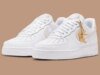 Nike Adds Snakeskin And Golden Charms To This Women’s Air Force 1